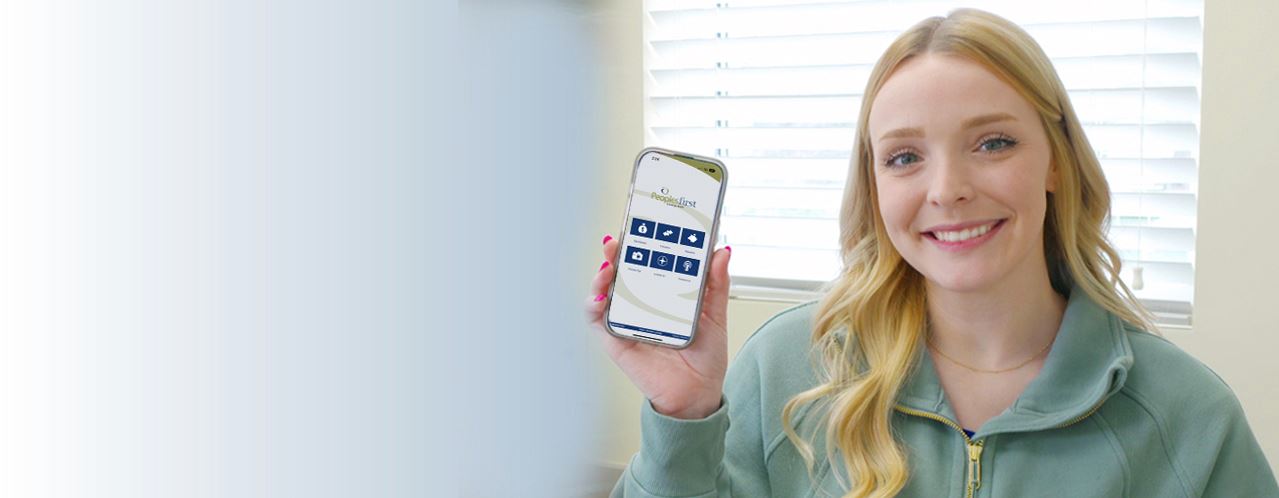 Woman holding cell phone